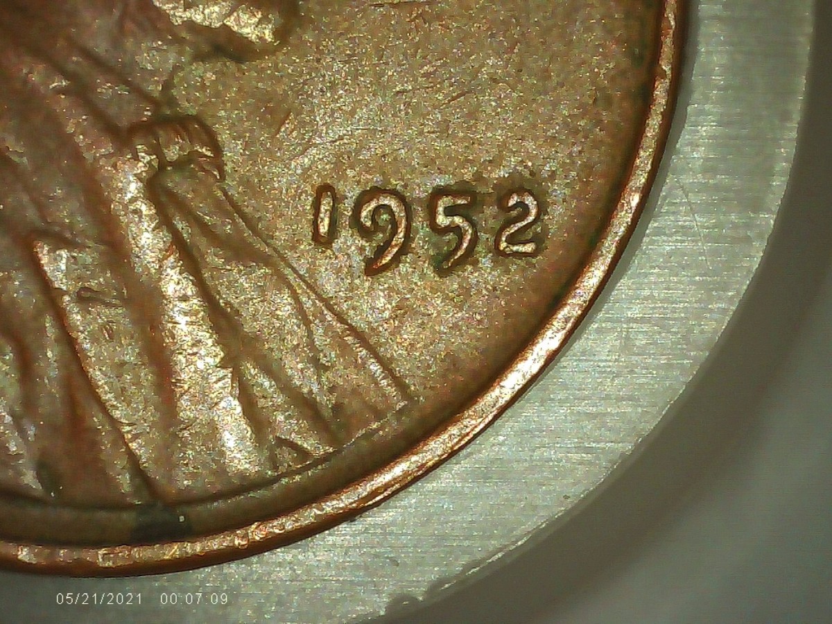 Close-up of 1952-D Doubled Die Obverse penny showing hub doubling on date numerals and LIBERTY lettering